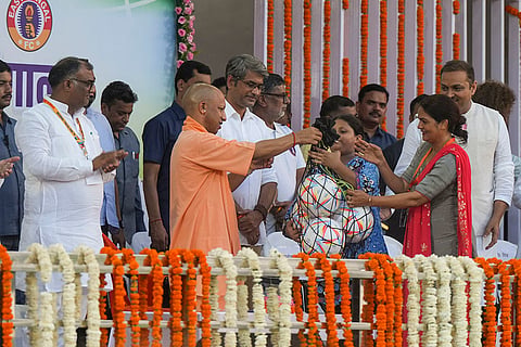 Uttar Pradesh Chief Minister Yogi Adityanath during a exhibition match between Mohun Bagan and East Bengal 